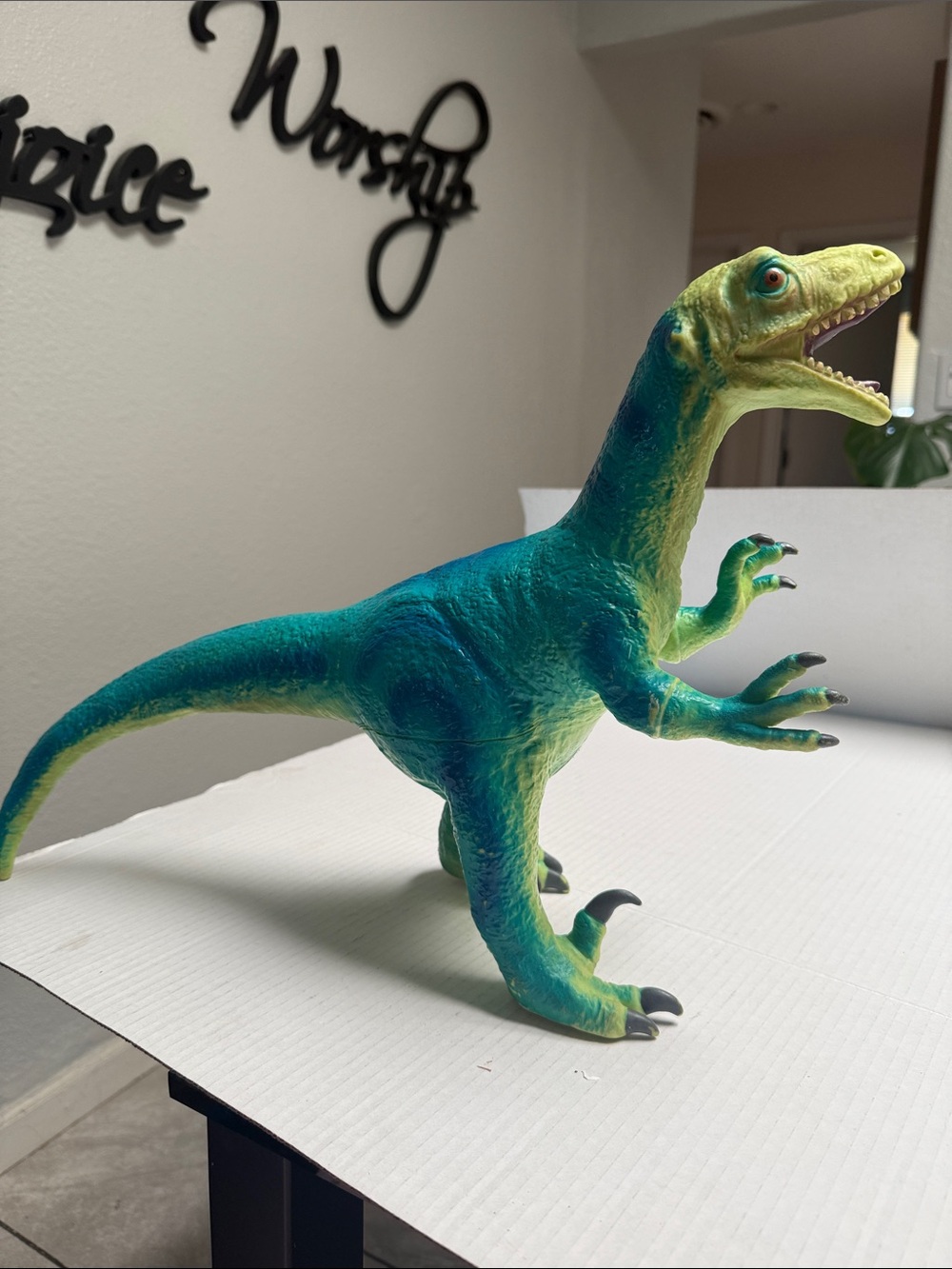Toysmith Epic Dino Velociraptor figure made of soft vinyl measures 20 inches